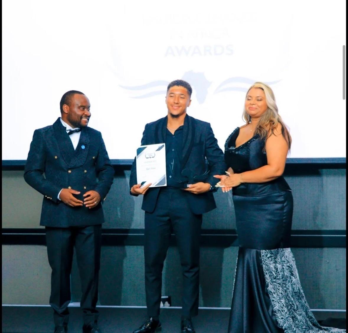Real United Football Academy receiving the 2026 Emerging Brands in Africa Award